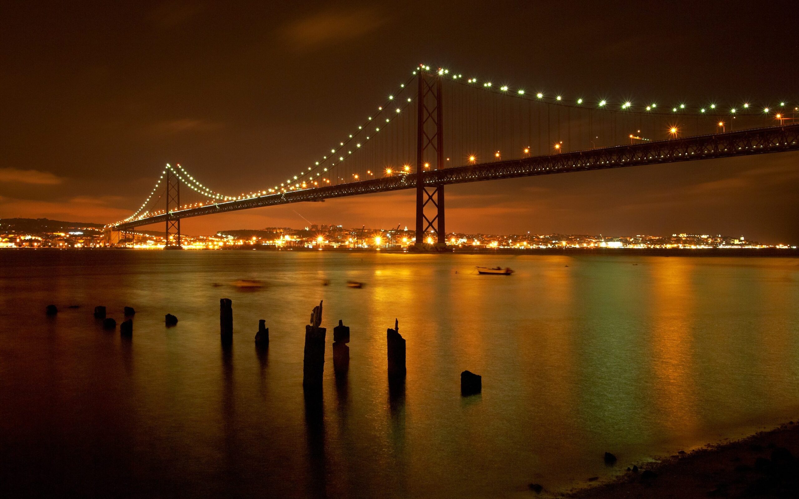 lisbon city guide bridge at night