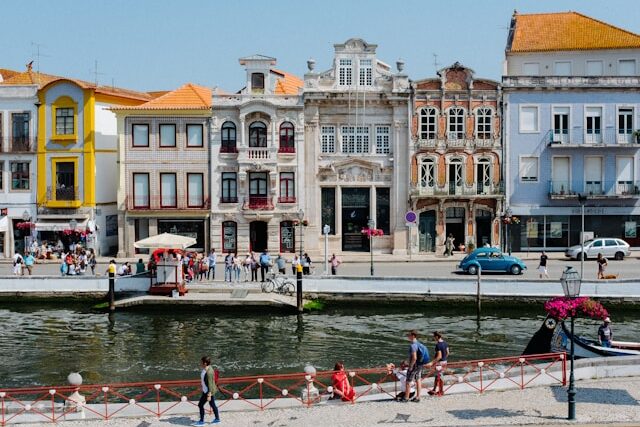 Colourful houses in front of a canal in Aveiro Portugal
