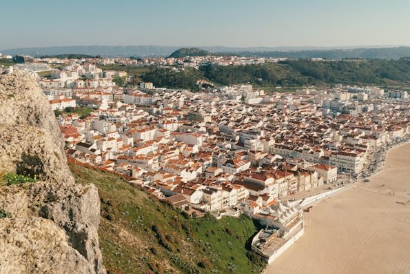 Aerial view of the Nazaré town in front of a sandy beach