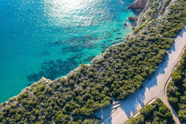 Aerial view of a scenic coastal road in Arrábida Natural Park Portugal