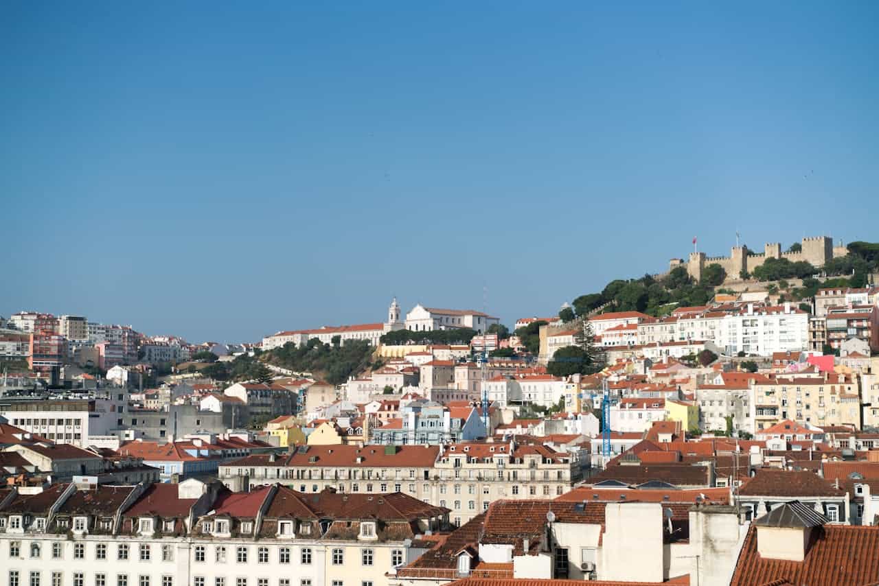 View over Lisbon’s Alfama neighborhood with São Jorge Castle on the hilltop